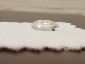 A water droplet demonstrating repellency on a treated surface by Alameda Carpet & Upholstery Cleaners in Portland, OR.