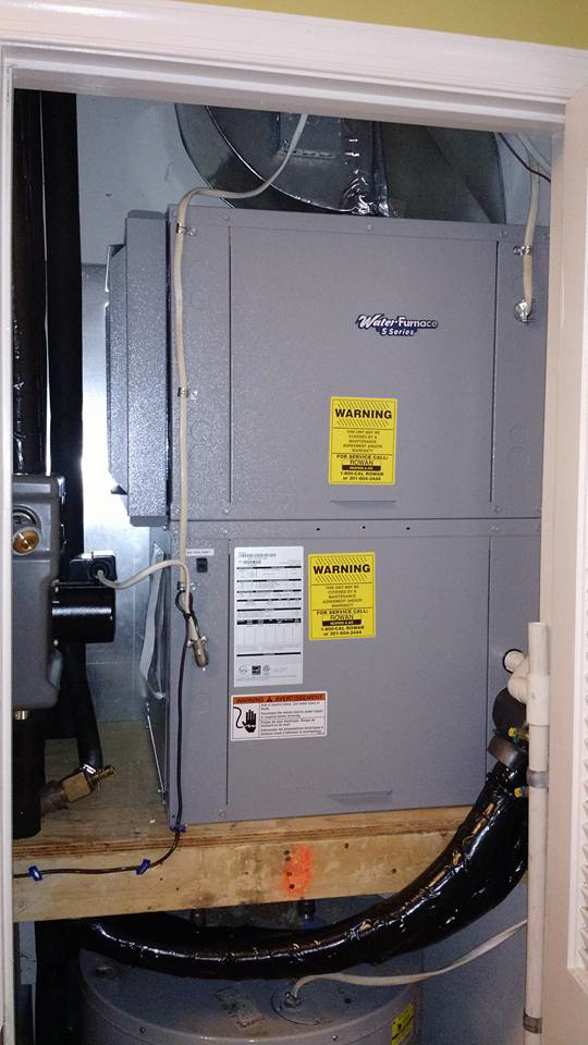 A close-up of a WaterFurnace 5 Series HVAC unit installed by Rowan Heating and Air Conditioning, Inc. in Highland, MD