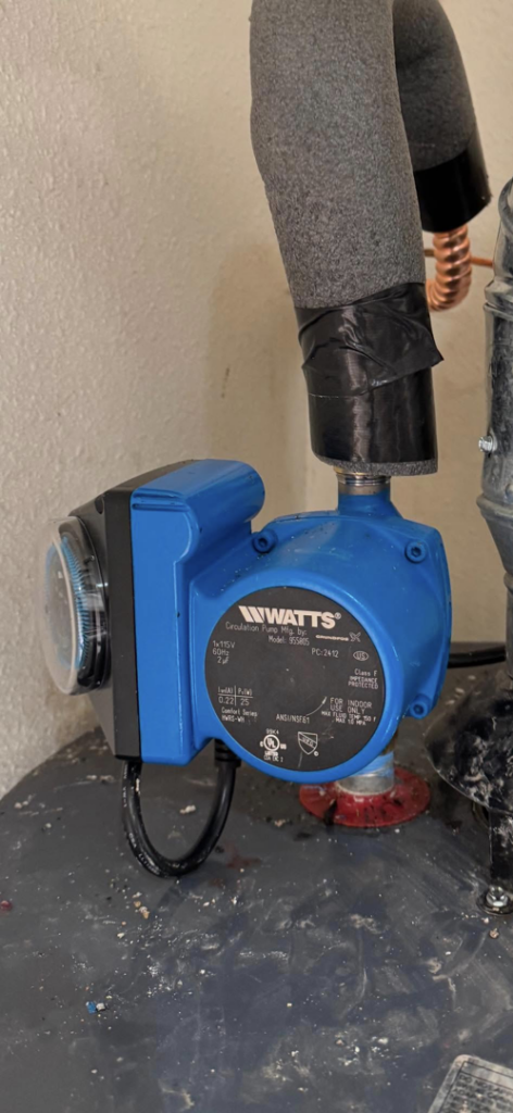 A Watts circulation pump installed as part of a heating system by NM Heating and Air in Albuquerque, NM.