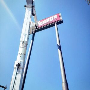 Lumenus Technologies, LLC performing electrical repair on a Wendy's sign in Lenexa, KS.