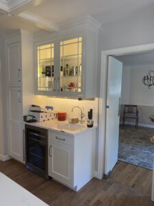 Wet bar with under-cabinet lighting and appliance hookups installed by All Electric llc in Denver, CO