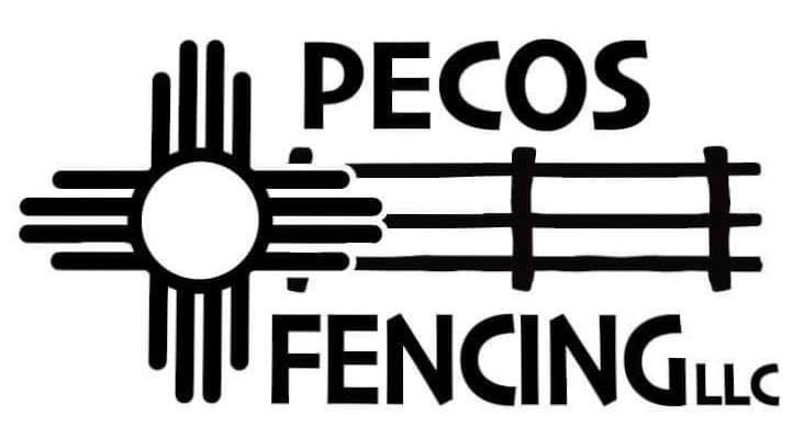 A long white corrugated metal fence with a matching gate installed by Pecos Construction and Fencing, LLC in Roswell, NM.