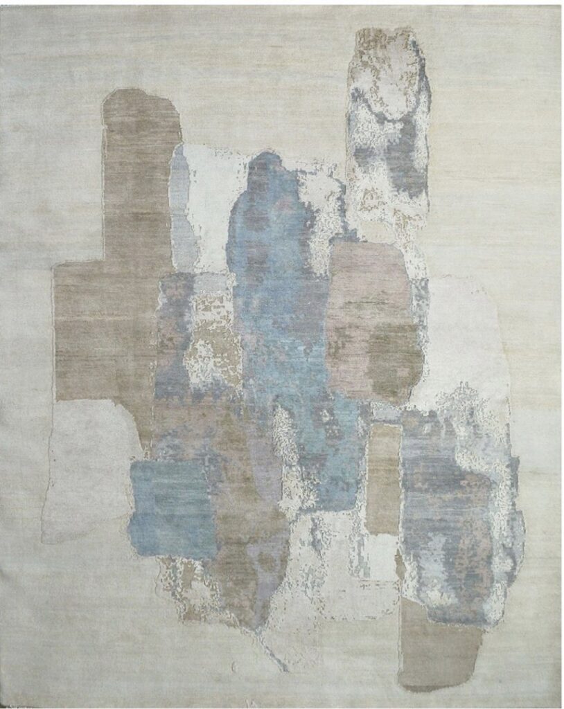 A white fluffy rug with bold black diamond patterns, offered by Organic Looms in Scottsdale, AZ