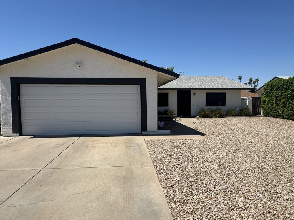 White garage door installation by Smokey's Garage Door Company in Glendale, AZ.
