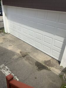 A white panel garage door installation by Snowbird Garage Doors Company in Worcester, MA.