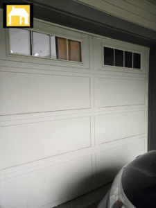 White panel garage door with decorative windows, installed or serviced by TH Locksmith And Garage Door Repair, Vancouver, WA.