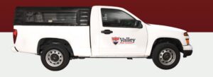 A white pest control truck with the Valley Pest Control logo, serving clients in Oshkosh, WI.