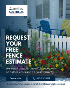 A white picket fence with colorful flowers in front of a house, installed by Michigan Fence Solutions in Macomb, MI.