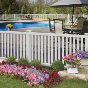 A white fence installed around a swimming pool for safety by Longhorn Fencing Eastern Idaho in Pocatello, ID.