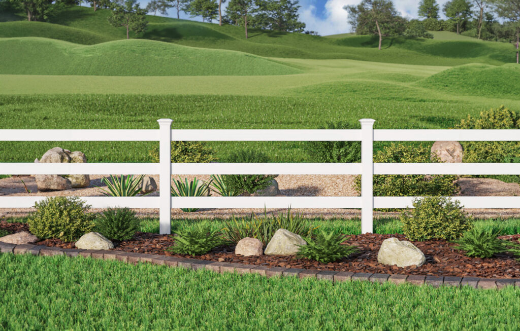 A classic white PVC two-rail ranch-style fence installed in a green landscape by MY PVC Fences in Miami, FL.