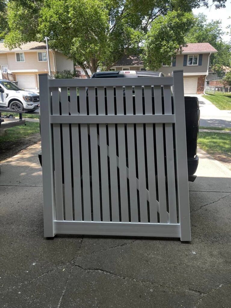 A white vinyl gate panel, ready for installation, from Custom Vinyl Fabrication in Omaha, NE.