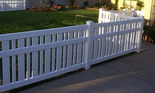 A white vinyl picket fence installation completed by Sublime Fencing LLC in North Logan, UT.