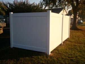 A white vinyl privacy fence enclosure installed by Hitz Fence in Lebanon, PA.