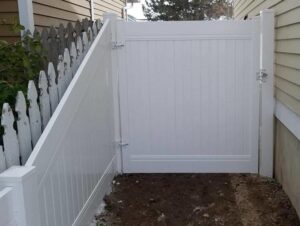 A new white vinyl privacy fence and gate installed by Allied Fence Co in Tulsa, OK.