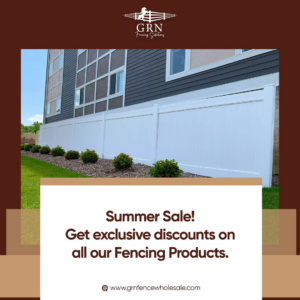 A newly installed white vinyl privacy fence next to a building by GRN Fence Solution in Newark, NJ.