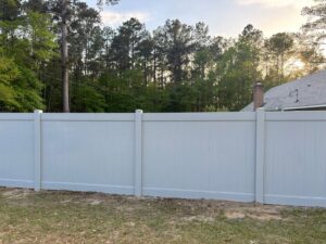A new white vinyl privacy fence installed by JB Nealy Fence in Elgin, SC.