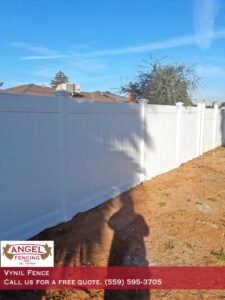 A white vinyl privacy fence installed for a residential property by Angel Fencing Inc. in Fresno, CA