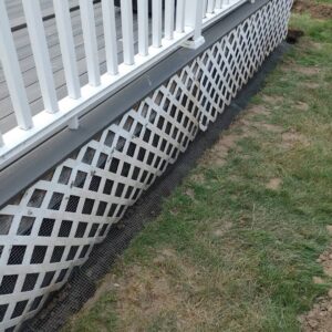 Wire mesh installed for wildlife exclusion along the base of a deck by Pest Express LLC in Rochester, NY