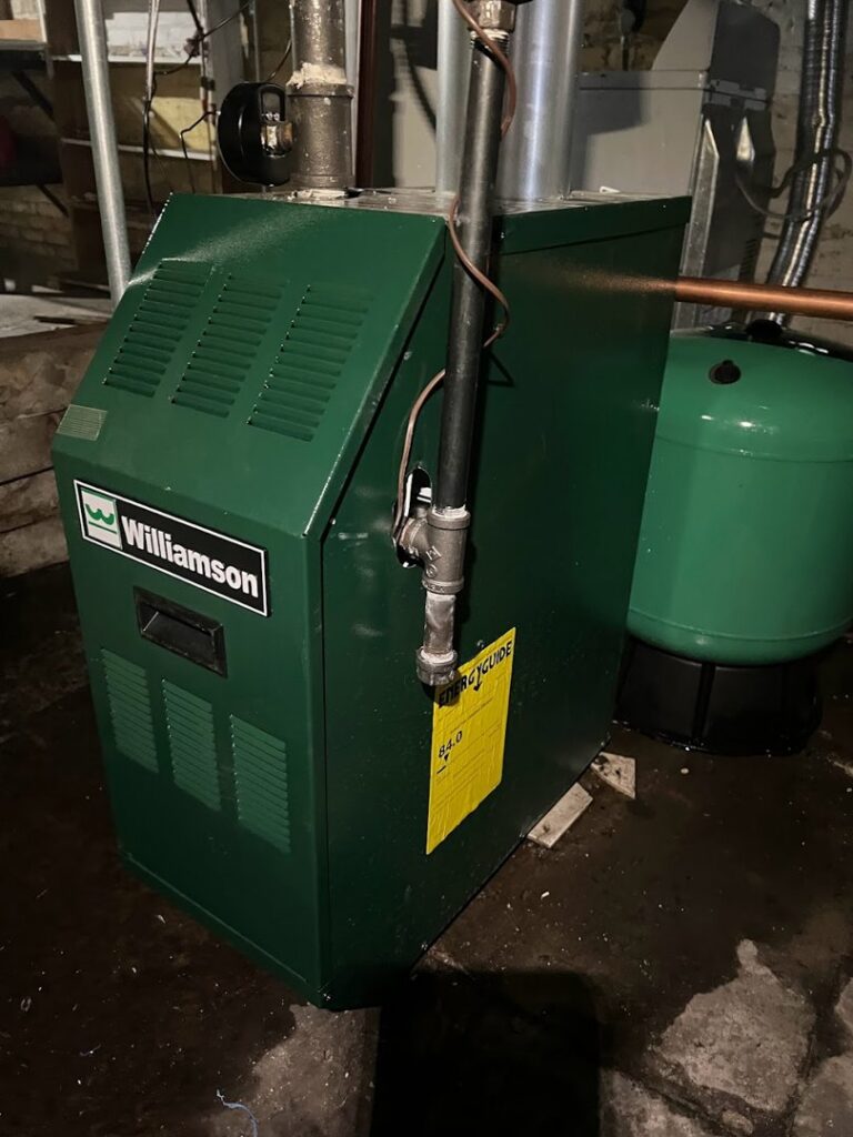 A green Williamson brand furnace or boiler installed by Done Right Air in West Allis, WI