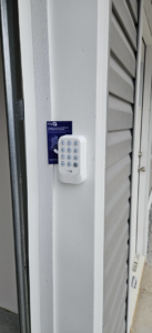 A newly installed wireless garage door keypad by Skreno Services in Summerville, SC.