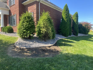 Wood cross-buck fence with wire mesh installed by Rager Fencing & Lawn Care, LLC in Owensboro, KY.