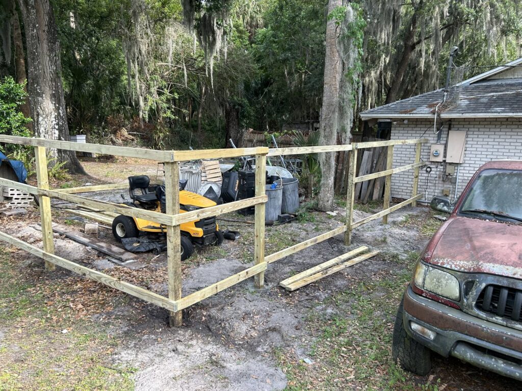 Wooden fence framework under construction by Florida Professional Fence LLC in Altamonte Springs, FL.