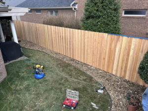 A wood privacy fence under construction by Rager Fencing & Lawn Care, LLC in Owensboro, KY.