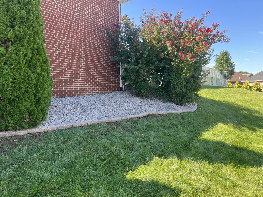 Wood privacy fence installed around a patio area by Rager Fencing & Lawn Care, LLC in Owensboro, KY.
