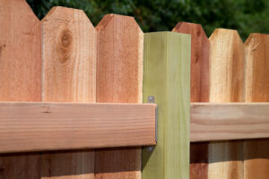 Close-up detail of a wooden fence under construction or repair by Fence Company Chicago in Chicago, IL