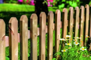 A newly installed wooden picket fence by The Columbus Fencing Company in Columbus, GA.