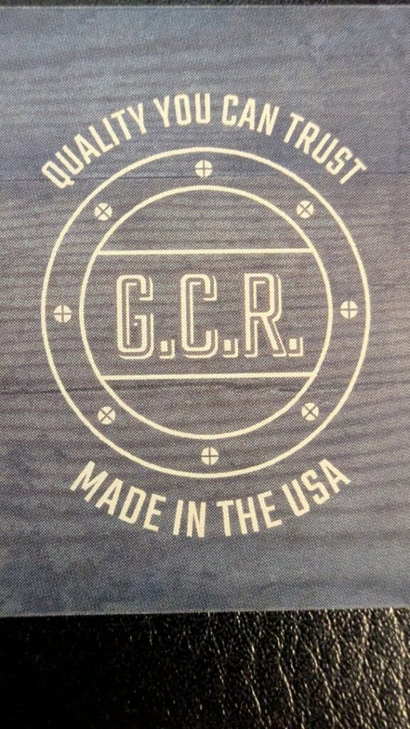 A charming wooden picket fence illuminated by solar lights at night, installed by Gifford Contracting & Repair in Goose Creek, SC.