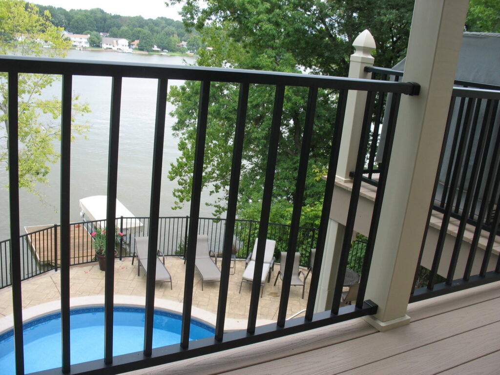 A newly installed wooden privacy fence enhancing a backyard with landscaping, by Custom Design Fence & Deck, Inc. in Ofallon, MO