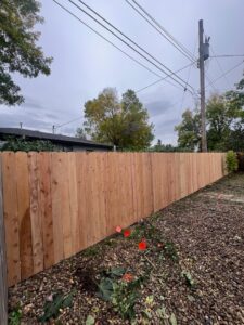 A newly installed wooden privacy fence by Western Fence in Hebron, ND.