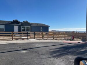 A newly installed wooden split-rail fence around a residential property by All Over Fence Idaho in Jerome, ID