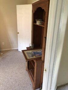 Worn and dirty carpet in a room, indicating need for service from Fresh Step Cleaning Services in Owensboro, KY