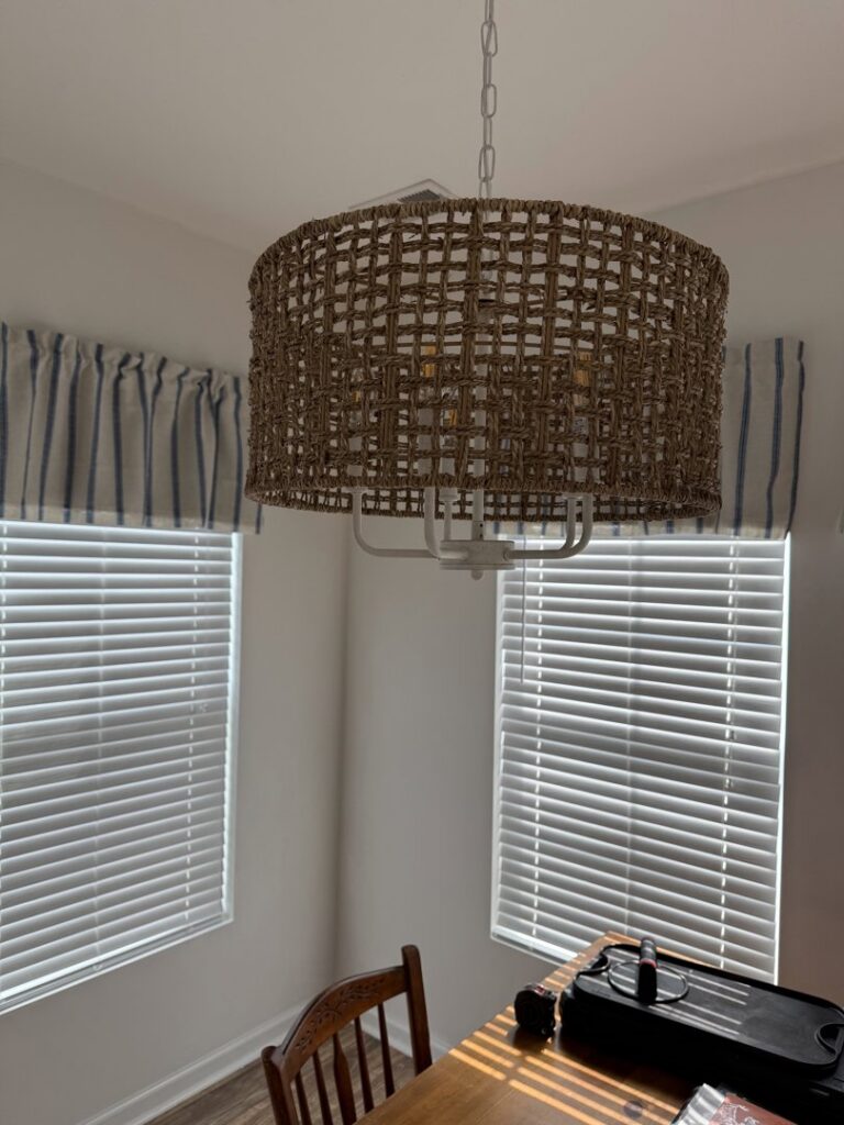 A decorative woven light fixture installed in a room by Strother & Son Electric in Mount Pleasant, SC.