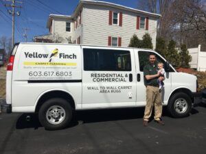The Yellow Finch Carpet Cleaning LLC service van, branded for residential and commercial carpet and area rug cleaning in Dover, NH.