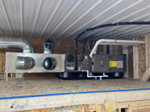 A new YORK furnace and air handler unit with ductwork installed by Erman Mechanical in Fort Wayne, IN