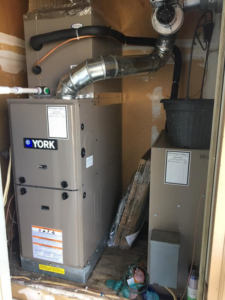 A new YORK furnace and air handler unit with ductwork installed by MTL Heating and Cooling LLC in West Haven, CT