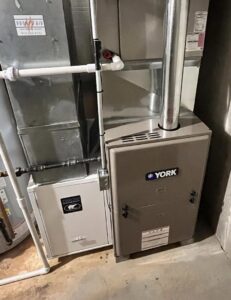 A newly installed York furnace and air handler unit by Pronto Air, an HVAC contractor in Olathe, KS.