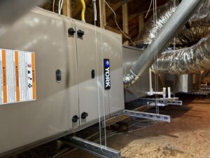 A new York HVAC system installation with ductwork in an attic by J & M Cooling & Heating LLC in Peoria, AZ.