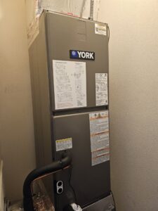 An indoor York HVAC air handler unit installed by J&W Heating and Air + Plumbing in Jacksonville, FL.