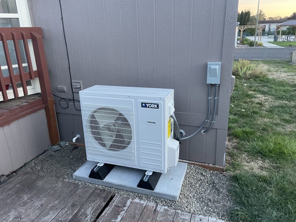 A new York mini-split HVAC outdoor unit installed by Smart HVAC LLC in Vancouver, WA.