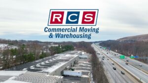 An aerial view of the RCS Moving & Storage warehouse facility located next to a busy highway in Richmond, VA.