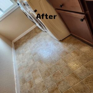 A sparkling clean tiled floor in a laundry room, showing the 'after' result from Martinez Cleaning Services in Kent, WA