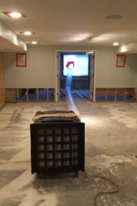 An air scrubber and drying equipment used for water damage remediation in a home by Anytime Flood Restoration in Thornton, CO