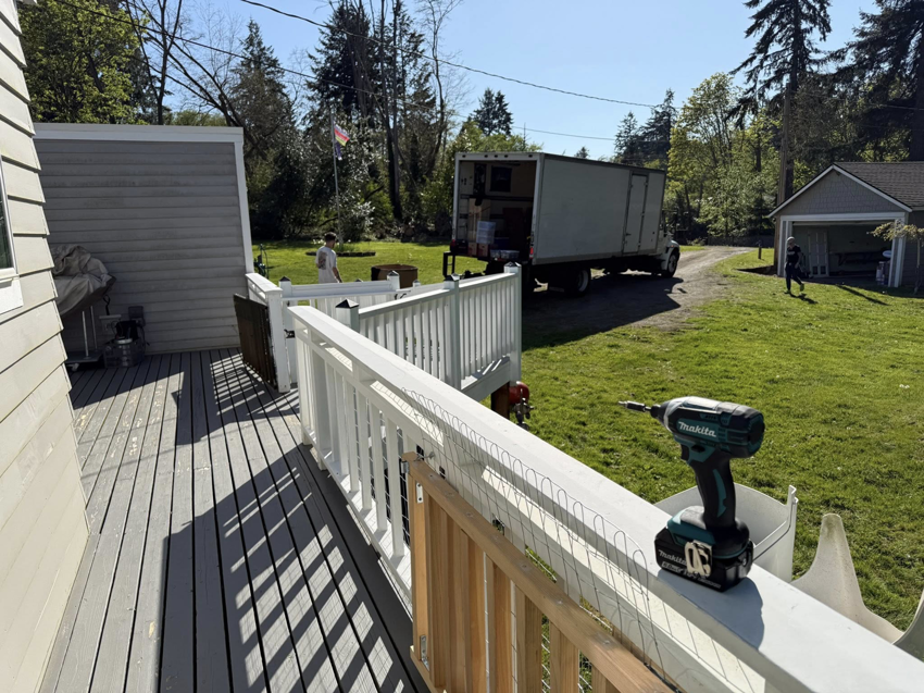 An Alto Moving truck and movers working at a residential property in Seattle, WA.