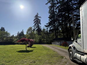An Alto Moving truck parked on a residential driveway, ready for a job in Seattle, WA.