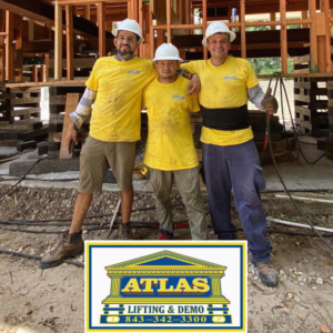 Atlas Lifting & Demo LLC crew members on a house elevation project site in Hilton Head Island, SC