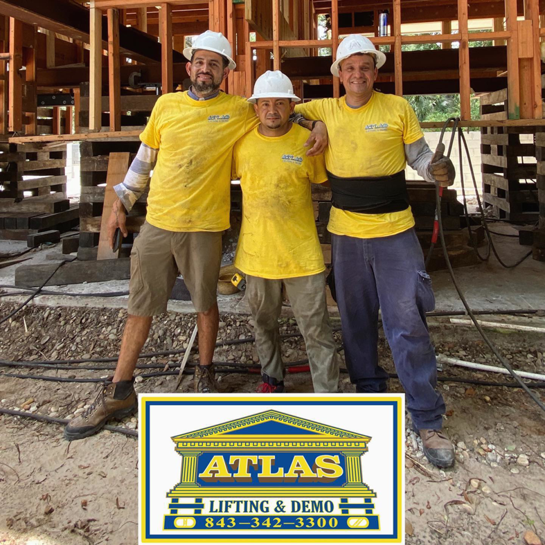 Atlas Lifting & Demo LLC crew members on a house elevation project site in Hilton Head Island, SC